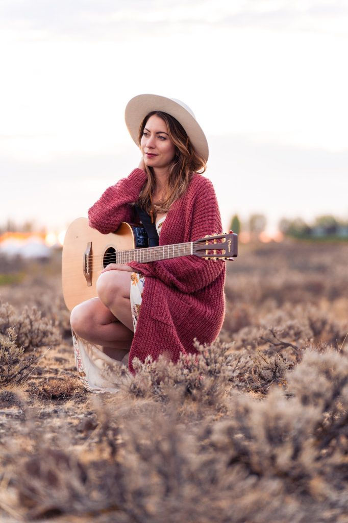Jessica Allossery, vocalist and guitarist, performing live